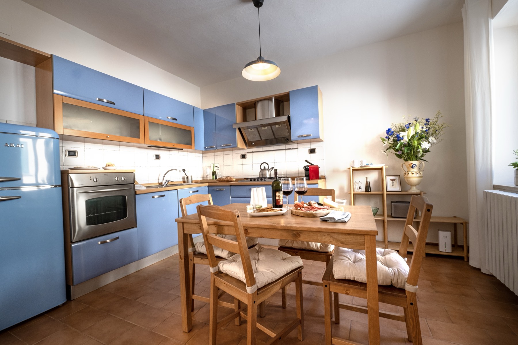 Kitchen with blue cabinets