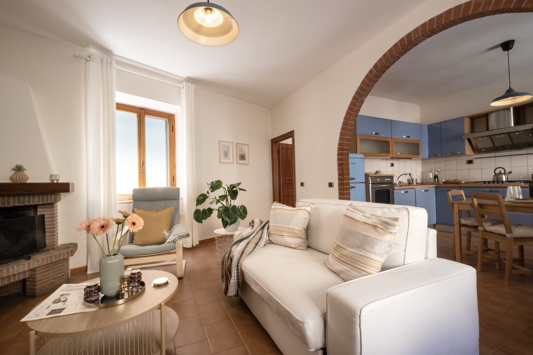 Living room with Tuscan brick arch